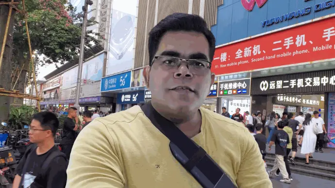 in front of Yuanwang Digital City, Shenzhen’s famous electronics market in China.